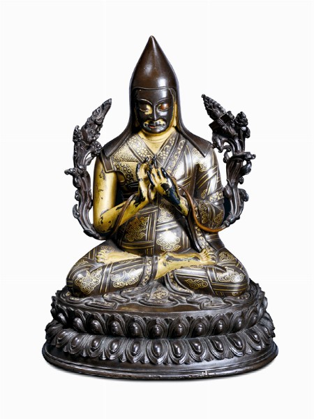 A rare and fine partially gilt bronze sculpture with gold marquetry representing Tsong-Khapa  
